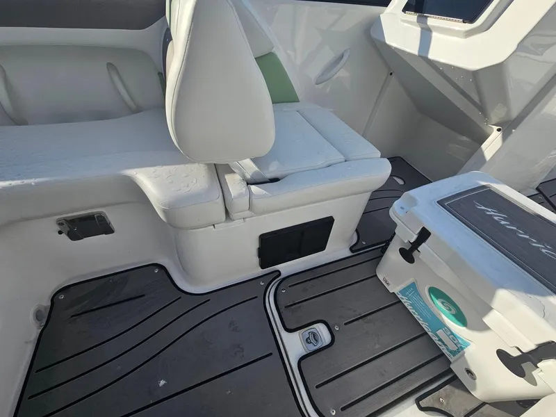 Slide: The Image of Interior of 2025 Hurricane SD2050-OB boat with seating and cooler on deck. - 12