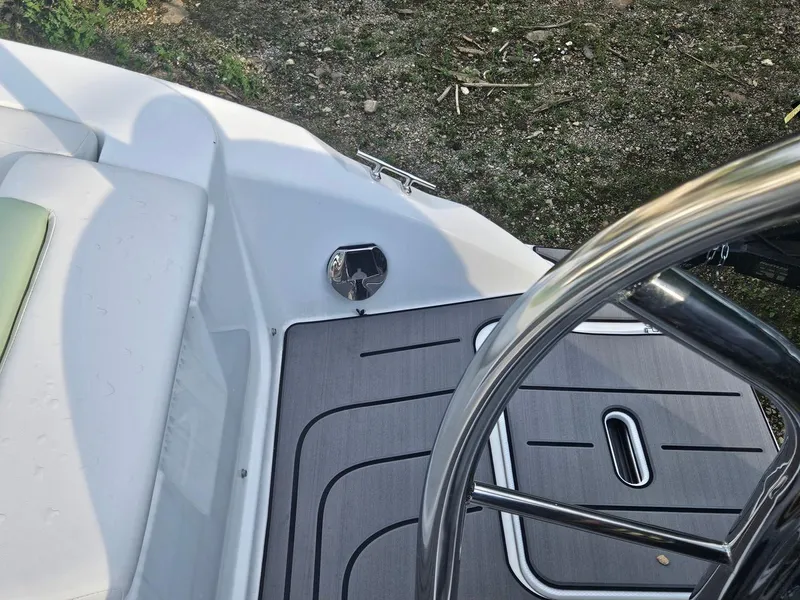 Slide: The Image of 2025 Hurricane SD2050-OB boat deck with sleek design and stainless steel railing. - 17