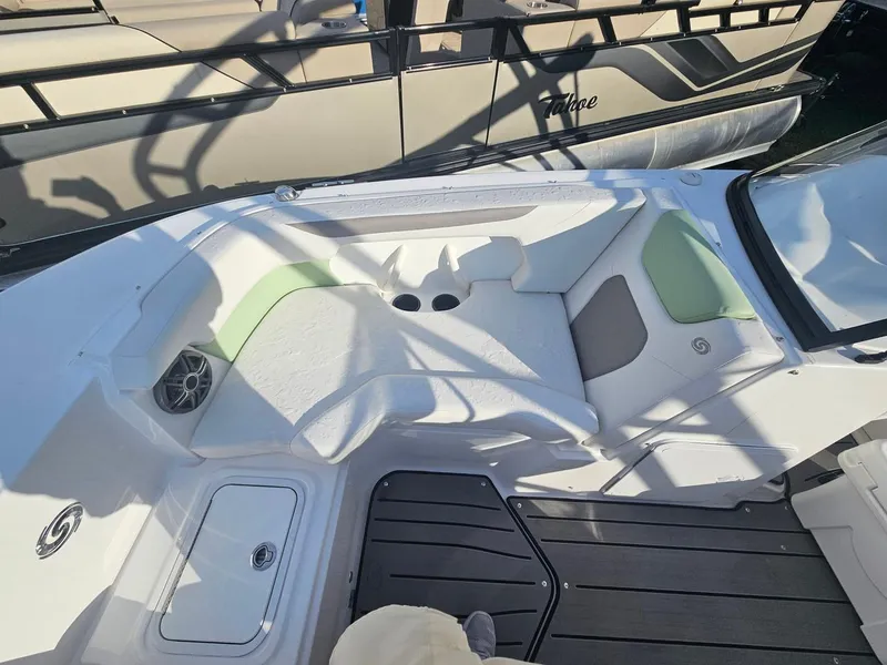 Slide: The Image of Interior of 2025 Hurricane SD2050-OB boat with seating and storage compartments. - 6