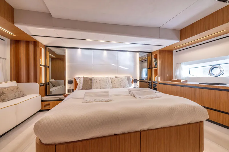 Slide: The Image of Luxurious master bedroom on the 2025 Solaris Power 60 Open yacht. - 29
