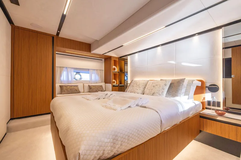 Slide: The Image of Luxurious bedroom interior of the 2025 Solaris Power 60 Open yacht. - 30