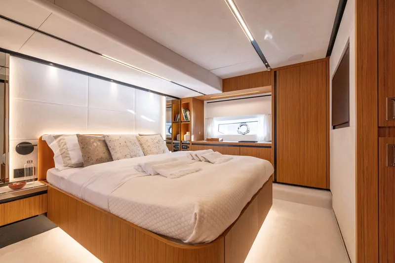 Slide: The Image of Luxurious bedroom interior of the 2025 Solaris Power 60 Open yacht. - 31