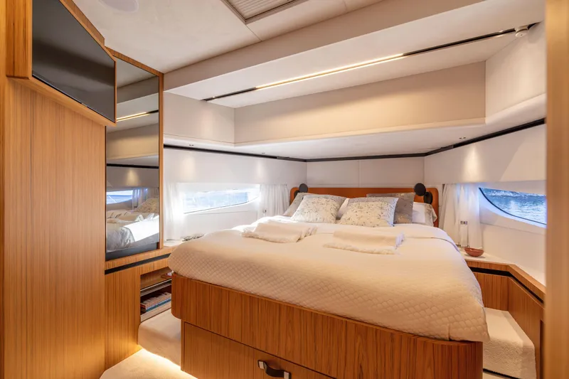 Slide: The Image of Luxurious bedroom interior of the 2025 Solaris Power 60 Open yacht. - 36