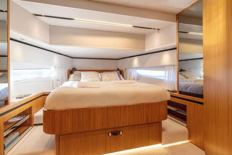 Slide: The Image of Luxurious bedroom interior of 2025 Solaris Power 60 Open yacht with modern wooden design. - 37