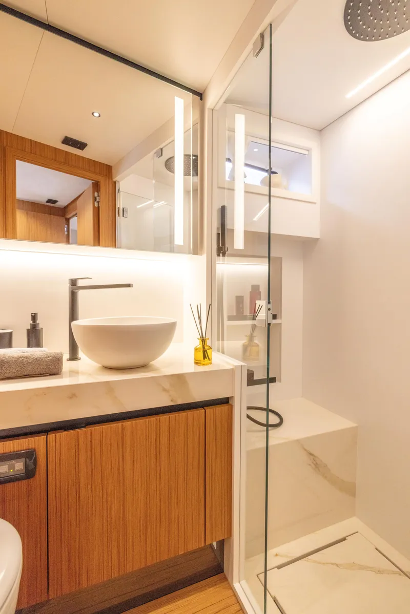 Slide: The Image of Modern bathroom in Solaris Power 60 Open yacht, 2025 model, featuring sleek design and luxury amenities. - 40