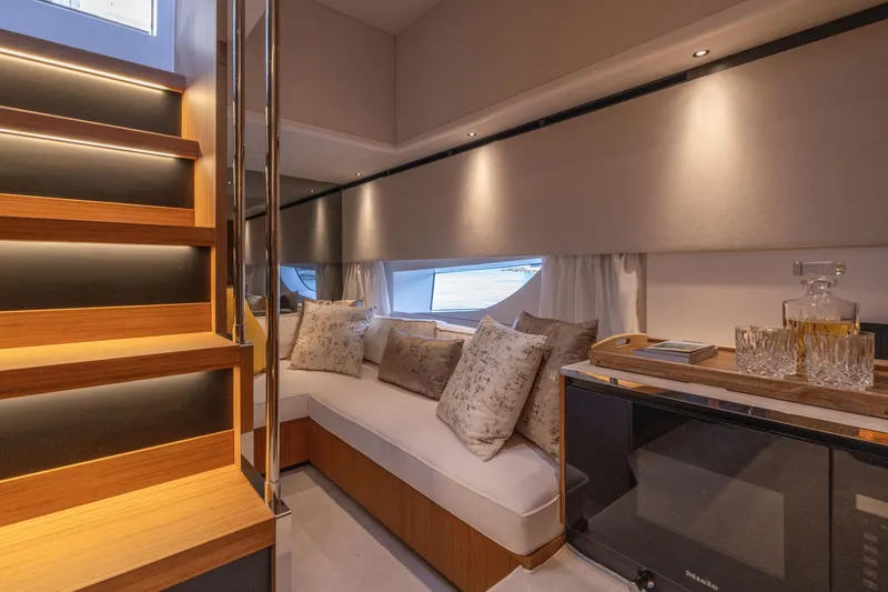 Slide: The Image of Luxurious interior of the 2025 Solaris Power 60 Open yacht with elegant seating and modern amenities. - 44