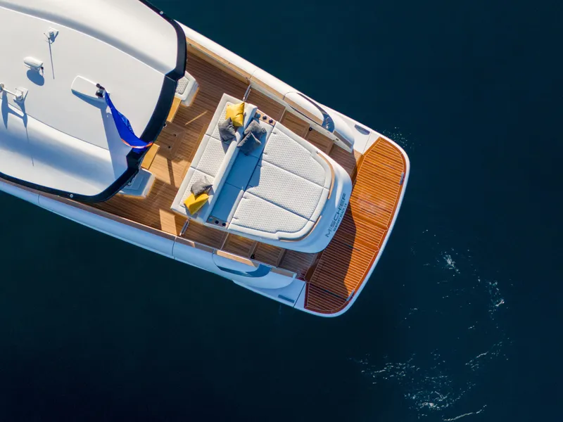 Slide: The Image of Aerial view of 2025 Solaris Power 60 Open luxury yacht on water. - 5