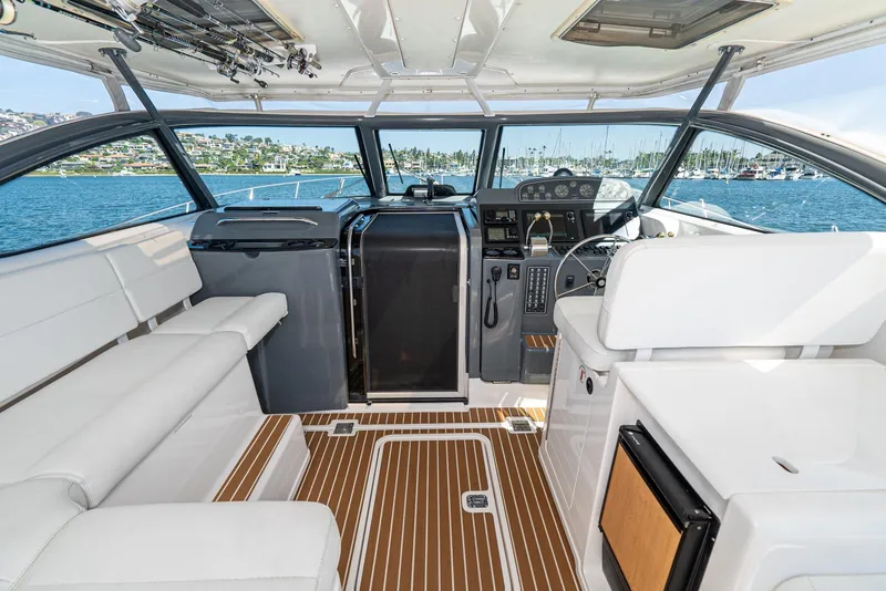 Slide: The Image of Interior of 2001 Tiara Yachts 3800, featuring sleek design and spacious seating. - 23