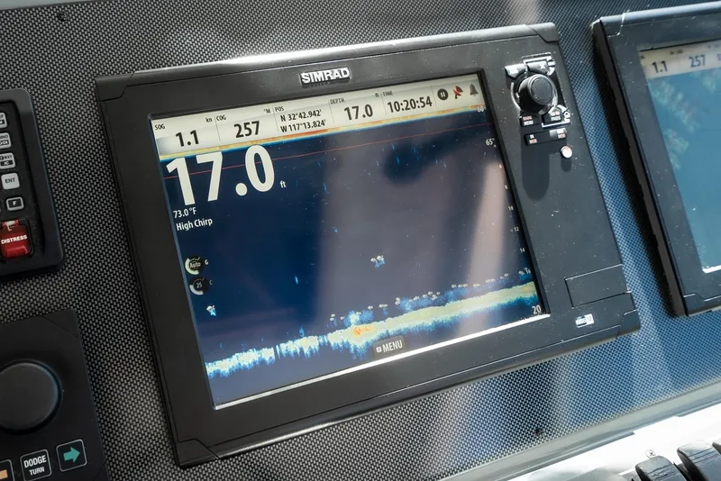 Slide: The Image of Simrad marine display on 2001 Tiara Yachts 3800, showing depth and navigation data. - 24