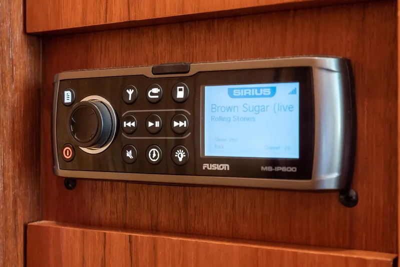 Slide: The Image of Fusion marine stereo system on 2001 Tiara Yachts 3800, displaying "Brown Sugar" by Rolling Stones. - 42