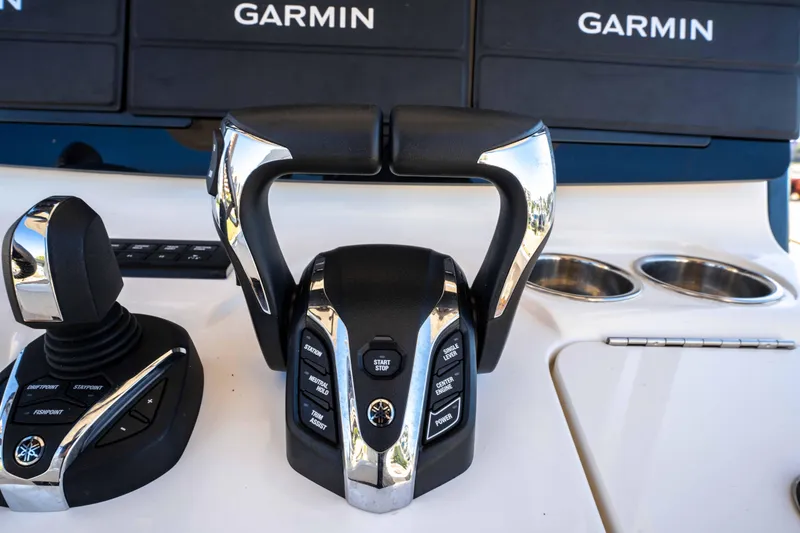 Slide: The Image of 2024 World Cat 260 CC-X control panel with Garmin displays and joystick. - 21