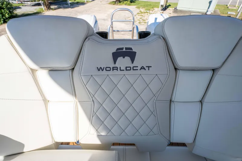 Slide: The Image of 2024 World Cat 260 CC-X boat seat with logo and diamond stitching. - 30