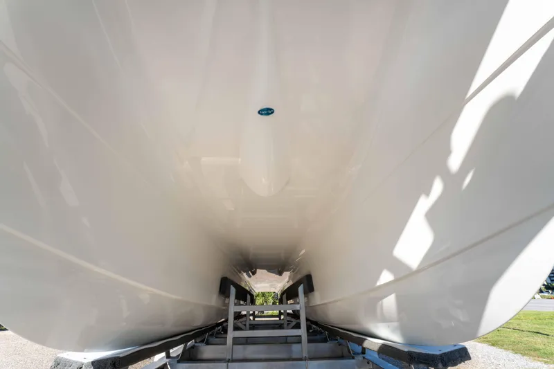 Slide: The Image of 2024 World Cat 260 CC-X catamaran hull on trailer, viewed from below. - 38