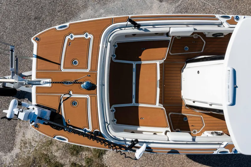 Slide: The Image of 2024 World Cat 260 CC-X boat, aerial view, showcasing deck layout and design. - 4