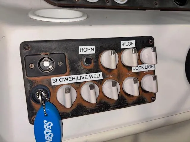 Slide: The Image of Control panel of a 2001 Hurricane Fun Deck GS 201 boat with labeled switches. - 16