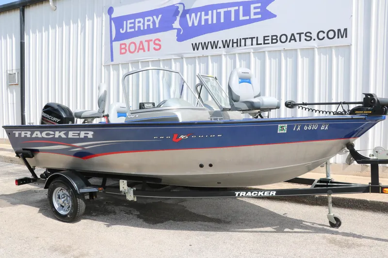 Slide: The Image of 2013 Tracker Pro V16 Guide WT boat on trailer at Jerry Whittle Boats dealership. - 3