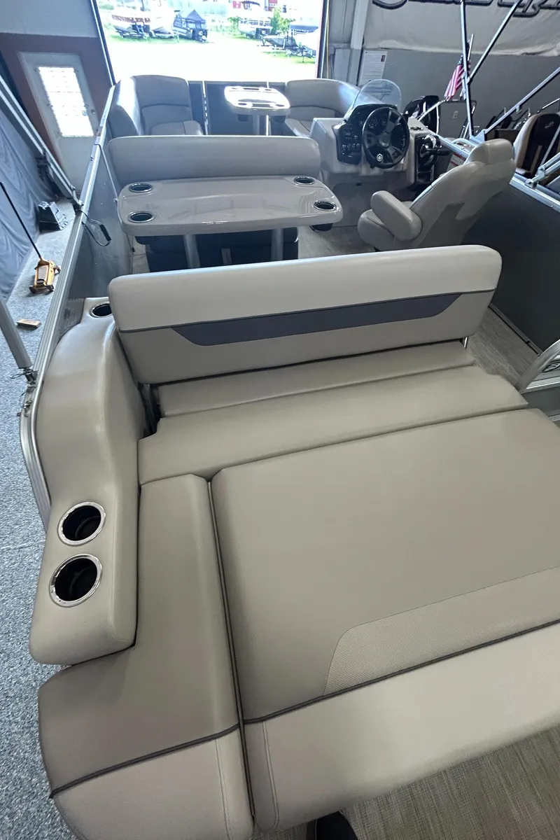 Slide: The Image of 2020 Princecraft Vectra 21 pontoon boat interior with seating and steering console. - 16