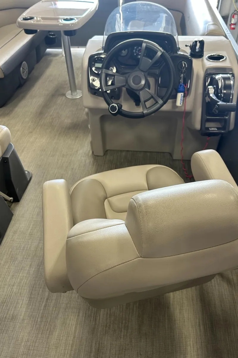 Slide: The Image of Interior of 2020 Princecraft Vectra 21 boat with steering wheel and seating. - 17