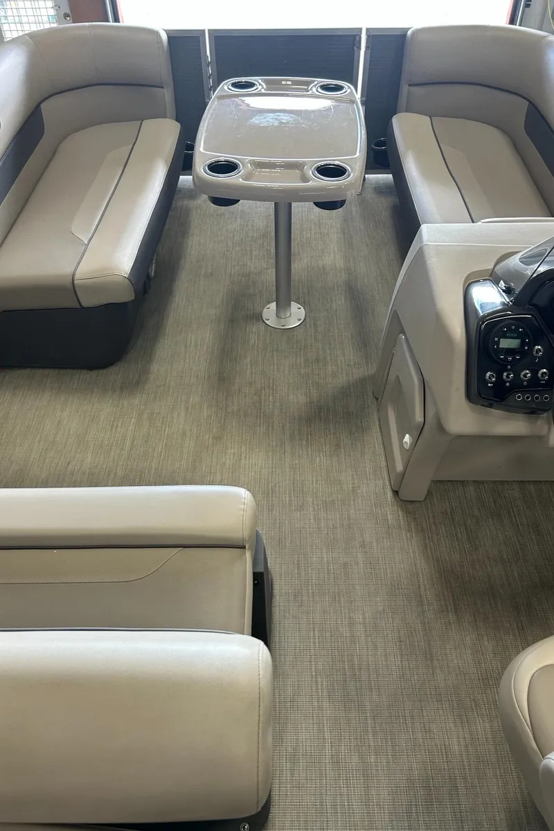 Slide: The Image of 2020 Princecraft Vectra 21 interior with seating and table, showcasing modern design and comfort. - 19