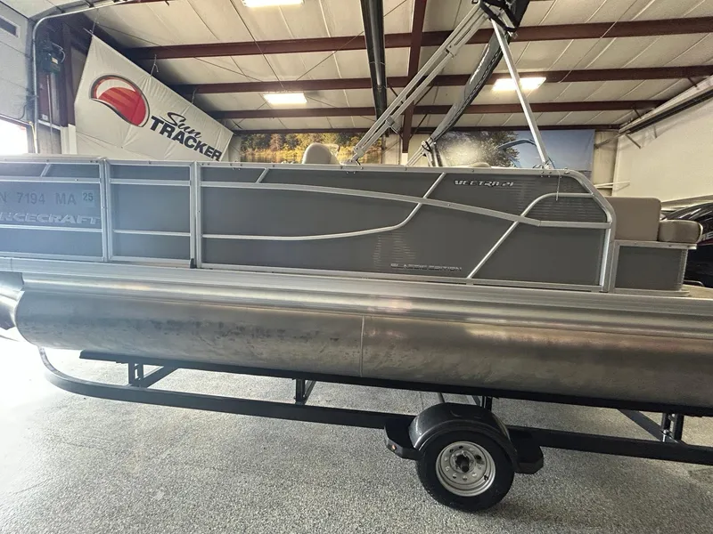 Slide: The Image of 2020 Princecraft Vectra 21 pontoon boat in showroom, side view. - 3
