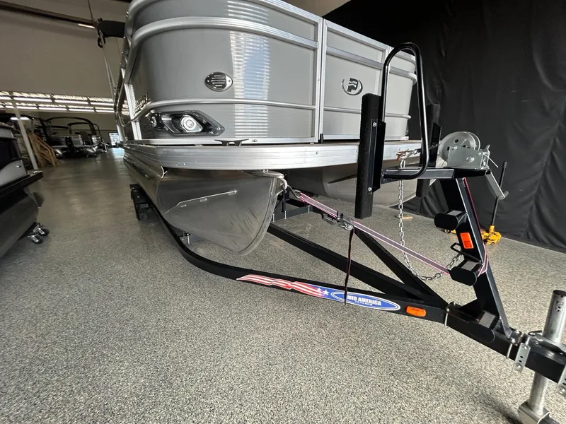 Slide: The Image of 2020 Princecraft Vectra 21 pontoon boat on trailer in indoor showroom. - 7