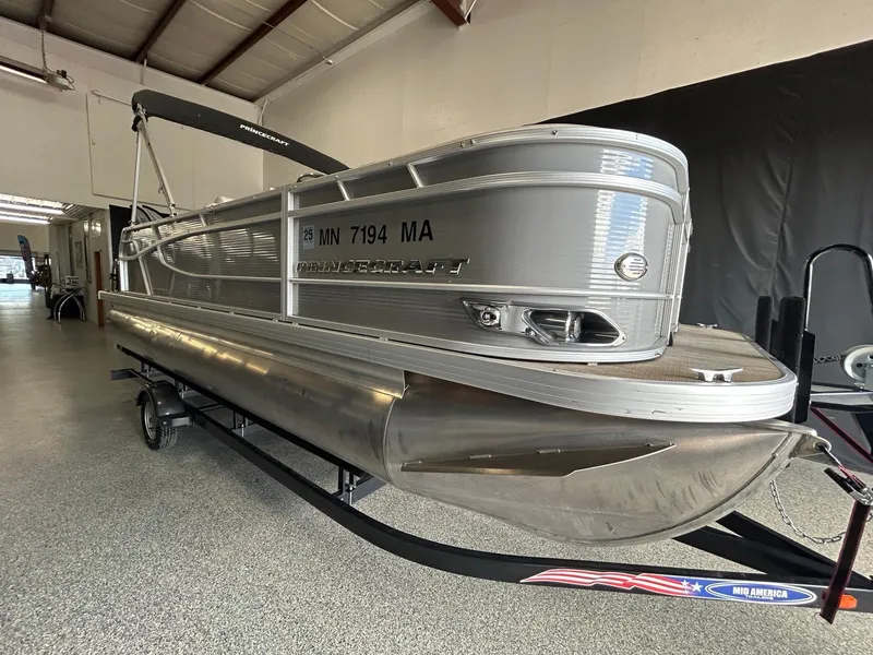 Slide: The Image of 2020 Princecraft Vectra 21 pontoon boat on trailer in indoor showroom. - 8