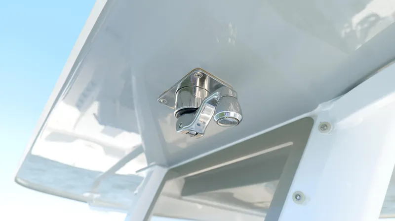Slide: The Image of Close-up of a 2020 Invincible 37 Catamaran's stainless steel fixture under a canopy. - 25