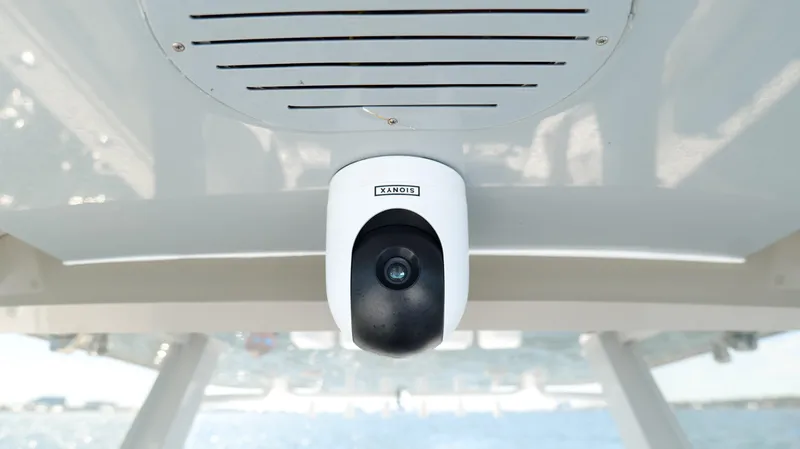 Slide: The Image of Security camera on 2020 Invincible 37 Catamaran ceiling, overlooking the ocean. - 27