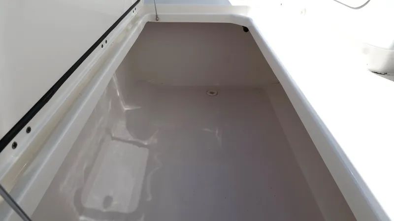 Slide: The Image of Storage compartment of 2020 Invincible 37 Catamaran, featuring a spacious interior. - 49