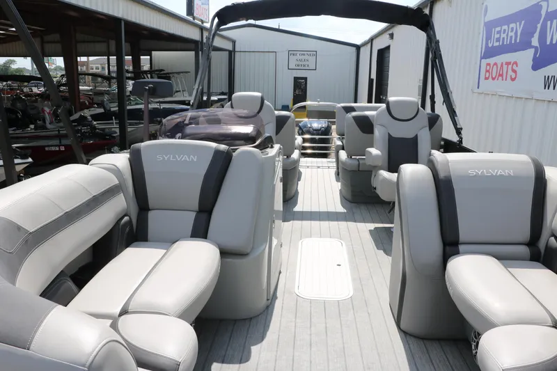 Slide: The Image of 2022 Sylvan L3 RLZ pontoon boat with luxurious seating and modern design. - 14