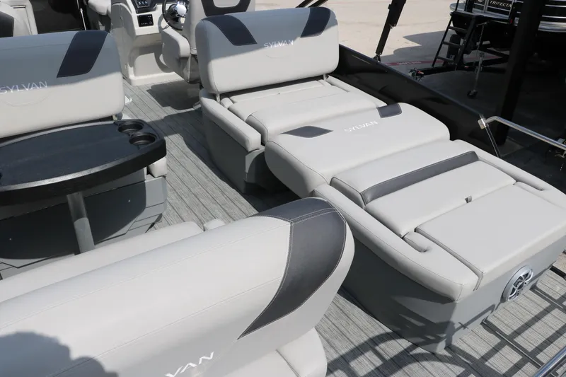 Slide: The Image of 2022 Sylvan L3 RLZ boat interior with gray seating and black accents. - 23