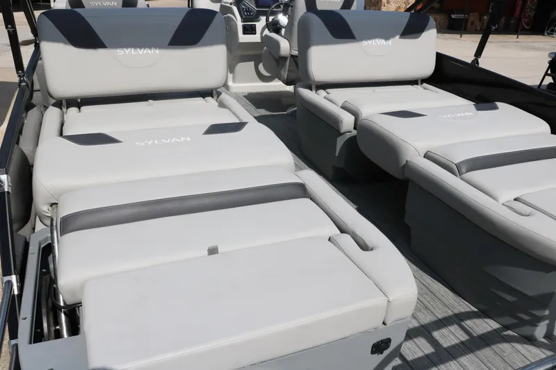 Slide: The Image of 2022 Sylvan L3 RLZ boat interior with luxurious gray seating and modern design. - 25