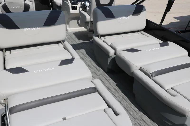 Slide: The Image of 2022 Sylvan L3 RLZ boat interior with luxurious gray seating and modern design. - 26