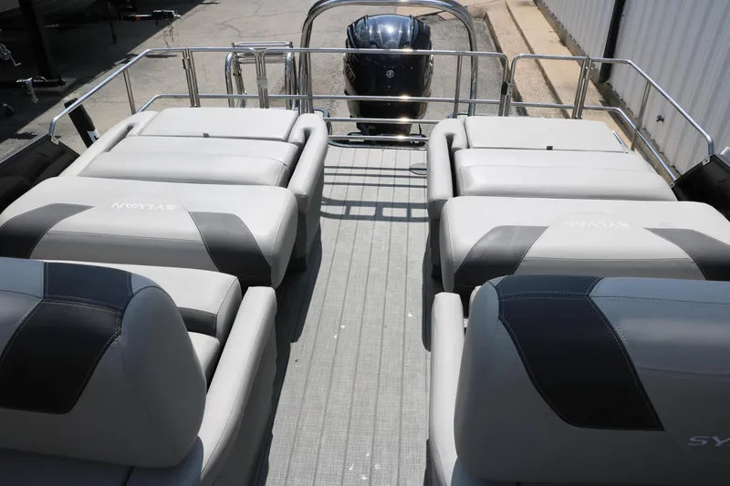 Slide: The Image of 2022 Sylvan L3 RLZ pontoon boat with luxurious seating and sleek design. - 27