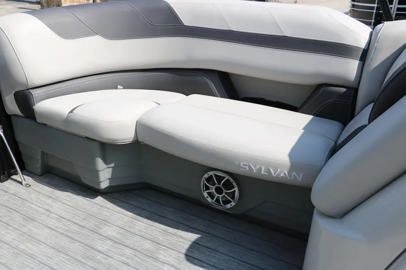 Slide: The Image of 2022 Sylvan L3 RLZ boat interior with gray seating and speaker. - 31