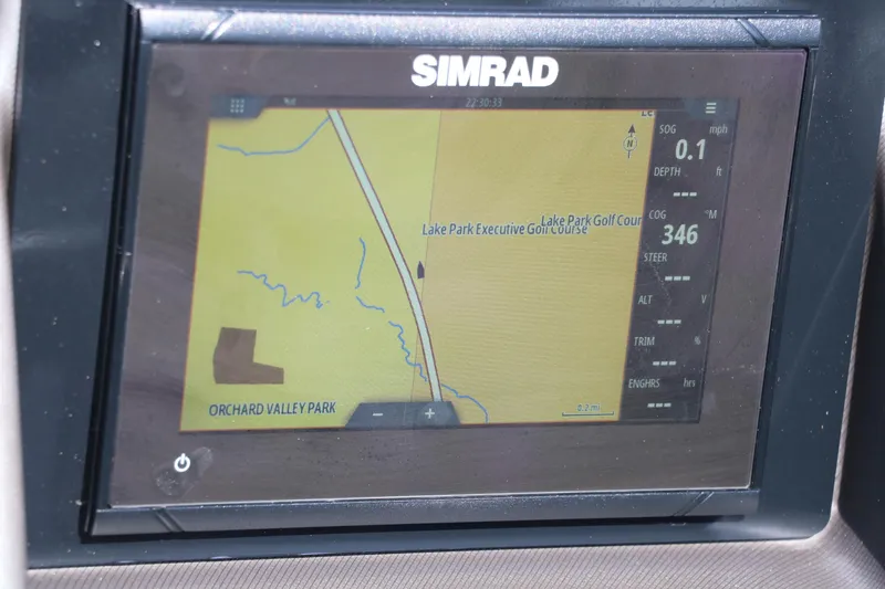 Slide: The Image of Simrad navigation display on 2022 Sylvan L3 RLZ, showing map and speed data. - 35