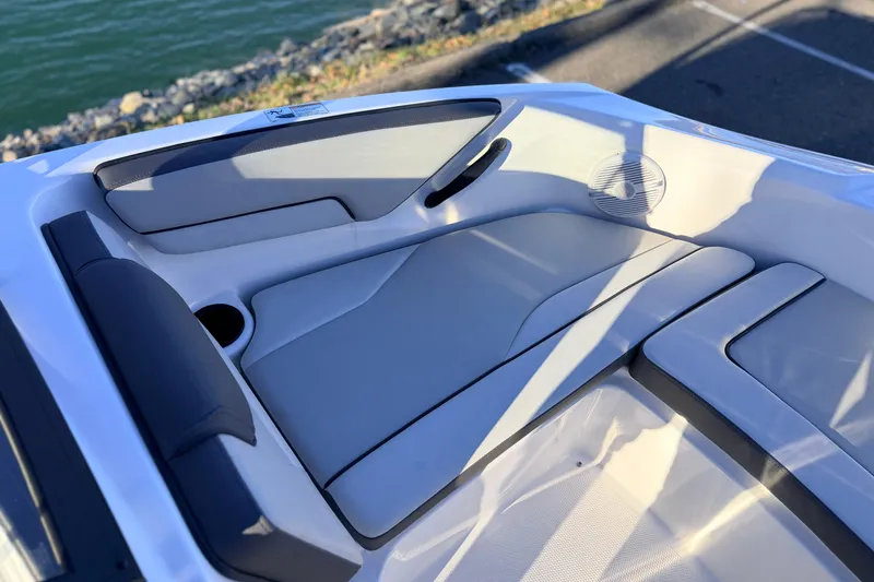 Slide: The Image of 2025 Yamaha Boats AR190 interior seating with sleek design and comfortable upholstery. - 31