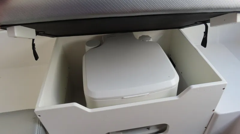Slide: The Image of Portable toilet in 2017 Sunsation 32 CCX boat compartment. - 12