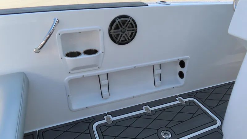Slide: The Image of Interior of 2017 Sunsation 32 CCX boat with cup holders and speaker. - 18