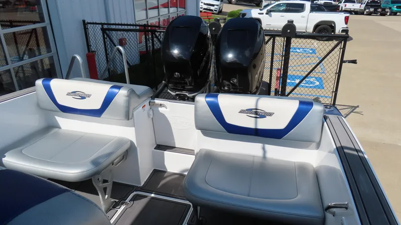Slide: The Image of 2017 Sunsation 32 CCX boat interior with seating and dual outboard motors. - 7