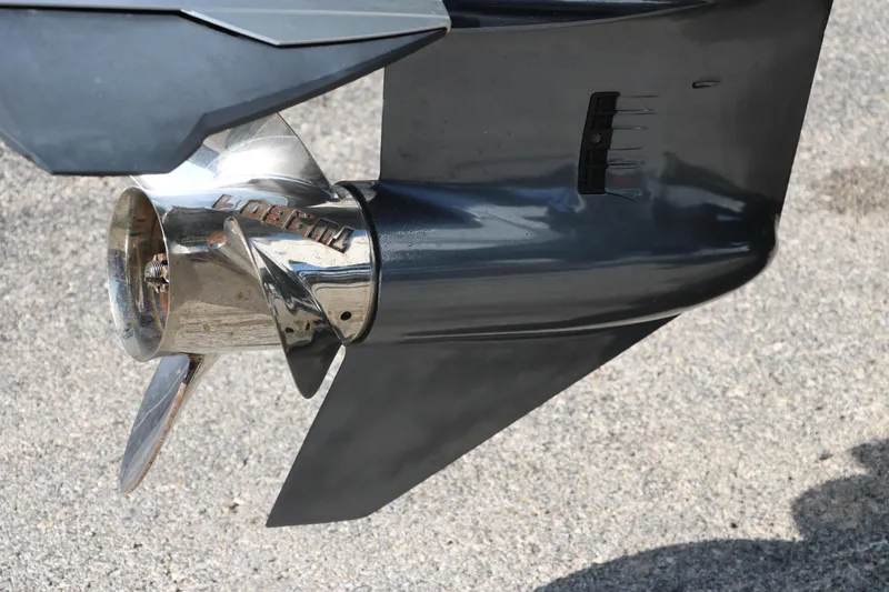 Slide: The Image of Close-up of a 2015 Sea Hunt BX22BR boat propeller on a concrete surface. - 10