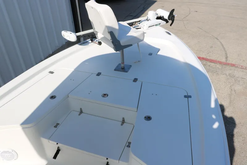 Slide: The Image of 2015 Sea Hunt BX22BR boat deck with seating and trolling motor. - 18