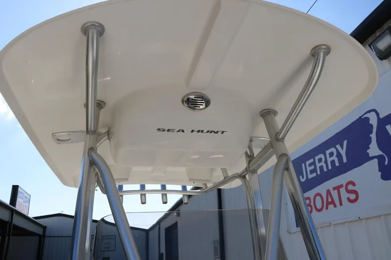 Slide: The Image of 2015 Sea Hunt BX22BR boat T-top with stainless steel supports at dealership. - 21