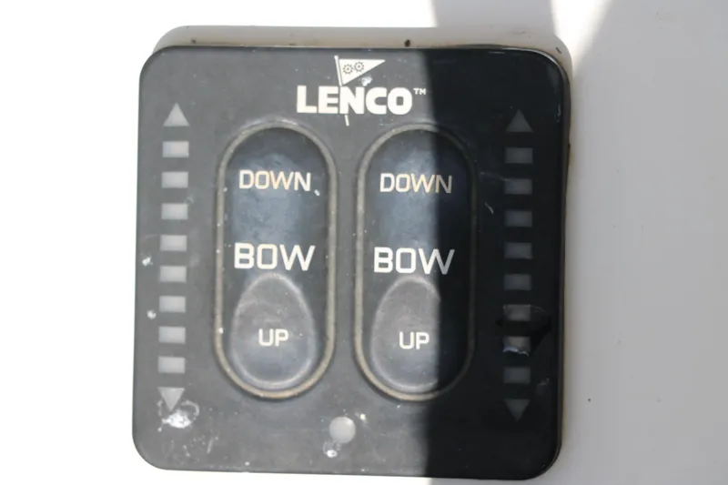 Slide: The Image of Lenco trim tab control panel on 2015 Sea Hunt BX22BR boat. - 30