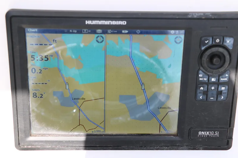 Slide: The Image of Humminbird ONIX10 SI GPS display showing navigation map near Lewisville. - 31