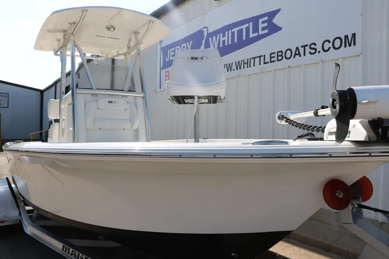 Slide: The Image of 2015 Sea Hunt BX22BR boat on trailer at dealership, side view. - 7