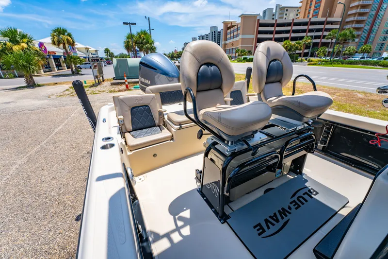 Slide: The Image of 2020 Blue Wave 2400 PureBay boat interior with comfortable seating and Yamaha engine. - 17