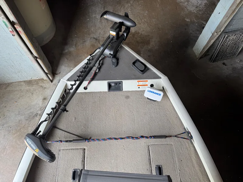 Slide: The Image of Bow of a 2004 Lowe 170W boat with trolling motor and Lowrance equipment. - 11