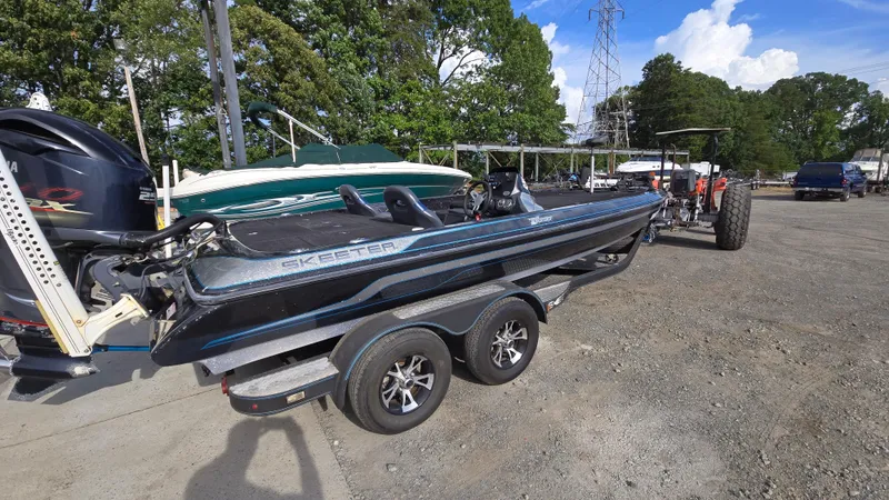 The Image of 2017 Skeeter ZX 250 boat on trailer in outdoor storage area. - 0