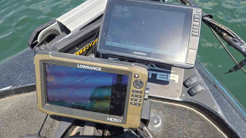 Slide: The Image of Fishfinder and GPS units on a 2017 Skeeter ZX 250 boat dashboard. - 21